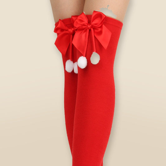Chaussettes hautes à pompons de Noël